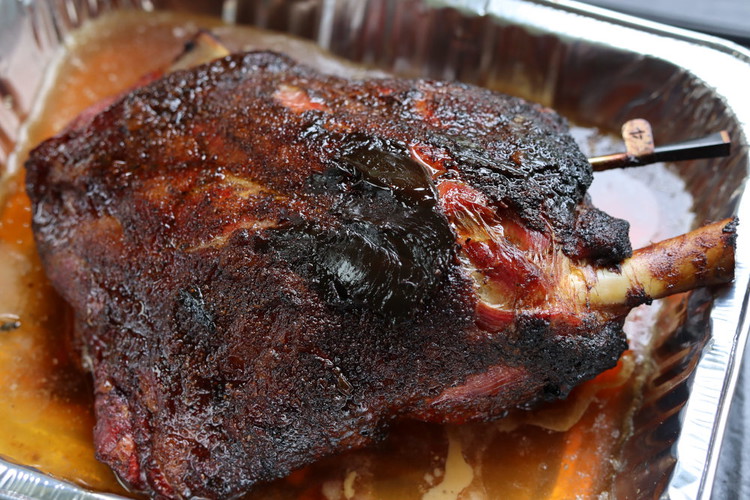 Image of Now you will place the shoulder into a cooking tray and we will add the stock, beer, beef tallow or butter and a tbsp of Vegemite slathered on the top of the lamb.Now seal it up with alfoil and place...
