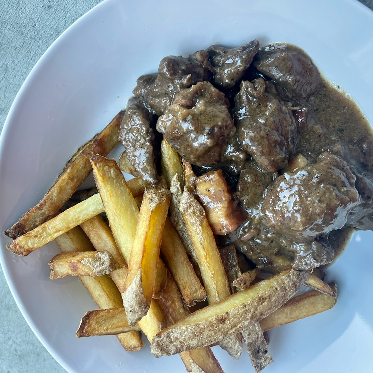 Image of When ready, serve the fries and stew together for a hearty meal.  Adjust with salt and pepper to taste.