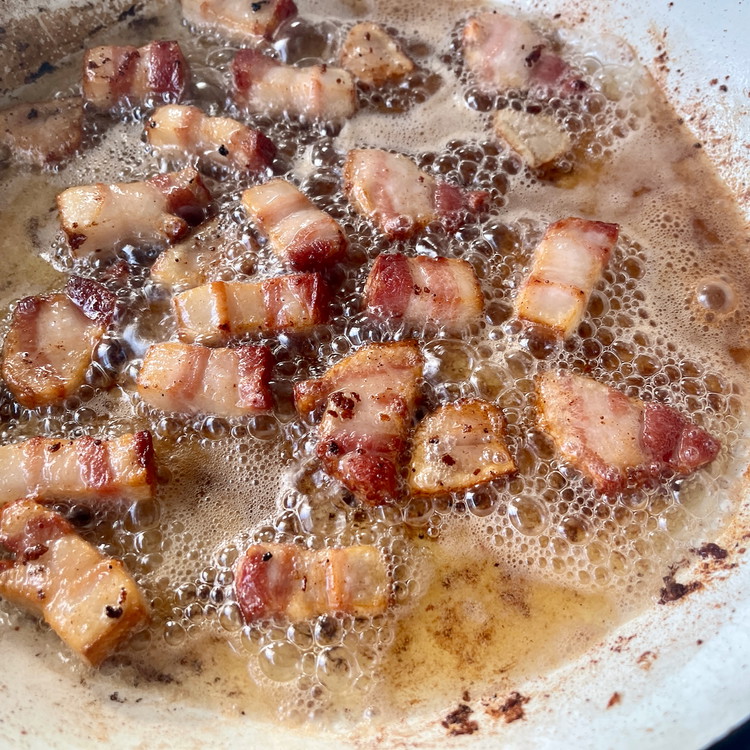 Image of When the stew meat has been browned, add the bacon lardons and reduce the heat to medium.  Render the bacon to golden brown, stirring occasionally.  Remove the bacon when ready.