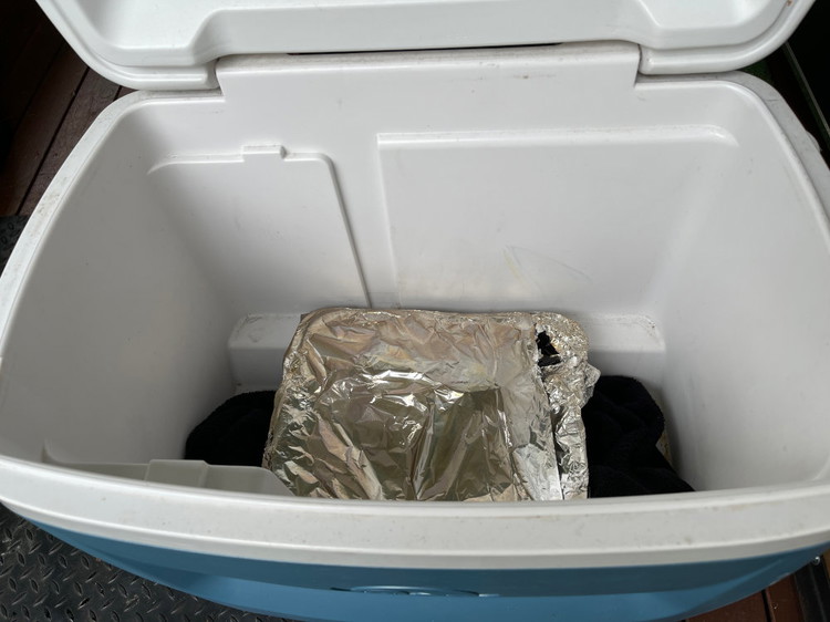Image of Place your wrapped lamb into an esky to rest for 1-2 hours. This will produce a superior result as resting the slow cooked meat will allow even distribution of the internal liquid throughout the lamb. 