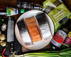 Image of To create the broth simmer the Chicken stock, garlic, ginger, soy sauce, fish sauce, and sesame oil for 30 mins.