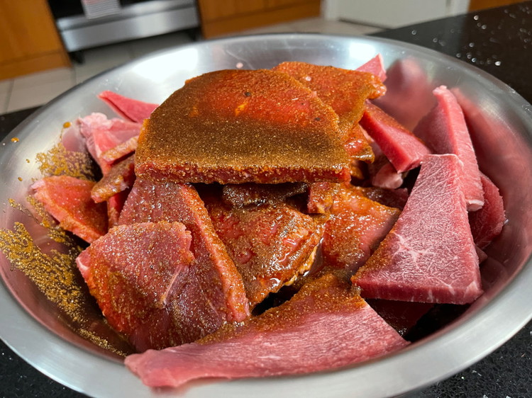Image of Then pour the glaze onto your beef strips and mix until all the beef is thoroughly coated. 