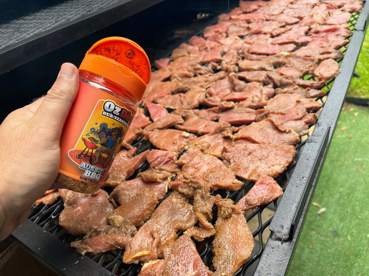 Image of Place your glazed beef strips onto your grate and give them an even coating of Oz Dirt BBQ rub, or your fave seasoning. 