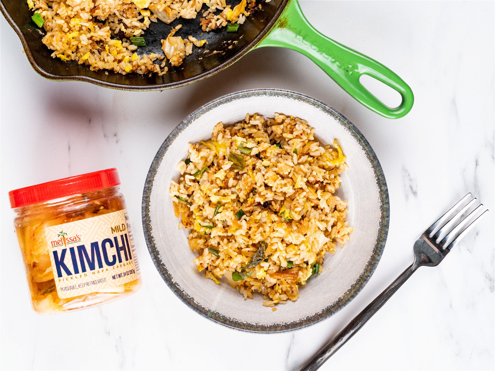 https://images.getrecipekit.com/20220214222415-kimchi-20fried-20rice-3.jpg?aspect_ratio=4:3&quality=90&