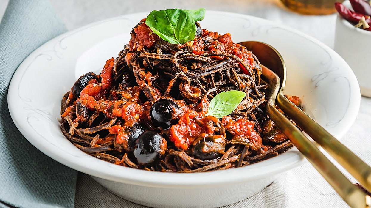 Image of Rich and spicy tomato and black olives spaghetti
