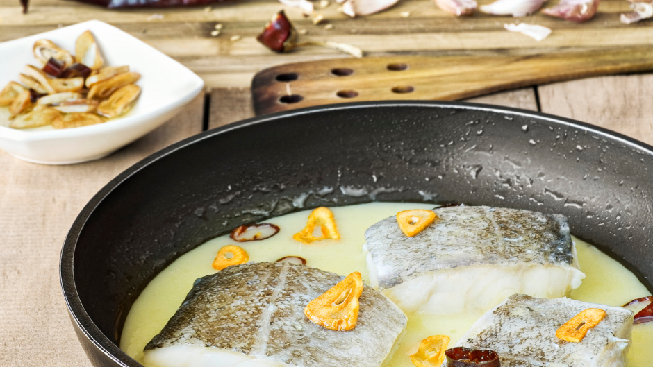 Image of Cod in pil-pil sauce (BACALAO AL PIL PIL)