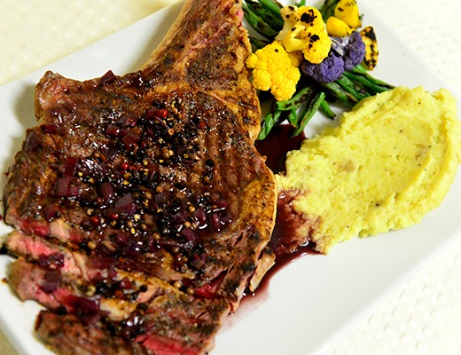 Image of Grilled Bone-In Rib Eye Steaks with Red Wine Peppercorn Sauce, DYP’s and Baby Vegetables