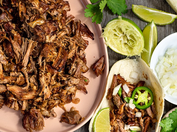 https://images.getrecipekit.com/20220216234950-savory-instant-pot-pork-carnitas.jpg?aspect_ratio=4:3&quality=90&