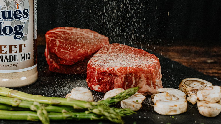 Image of Pat filets dry and sprinkle Blues Hog Beef Marinade. Let sit in refrigerator overnight.