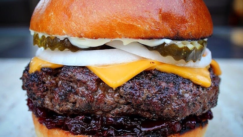 Image of Beef burger seasoned with SmokeyQ Fierce Bull Coffee Rub !