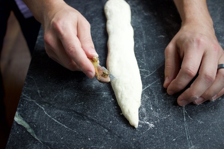 Image of Gently turn the baguettes over to seam side down, lame...