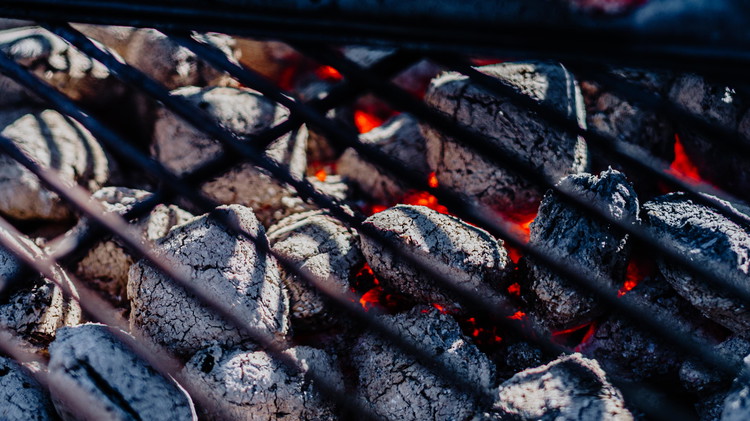 Image of Heat grill to around 500ºF and let the steak come to room temperature. For a charcoal grill, we recommend the Blues Hog Charcoal Briquettes for a longer, hotter burn.