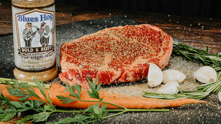 Image of The night before you cook, pat steak dry. Sprinkle Blues Hog Beef Marinade and generously add Bold & Beefy Seasoning for a dry brine. Place on a rack overtop a rimmed sheet pan. Set in refrigerator uncovered overnight.Bold and Beefy...