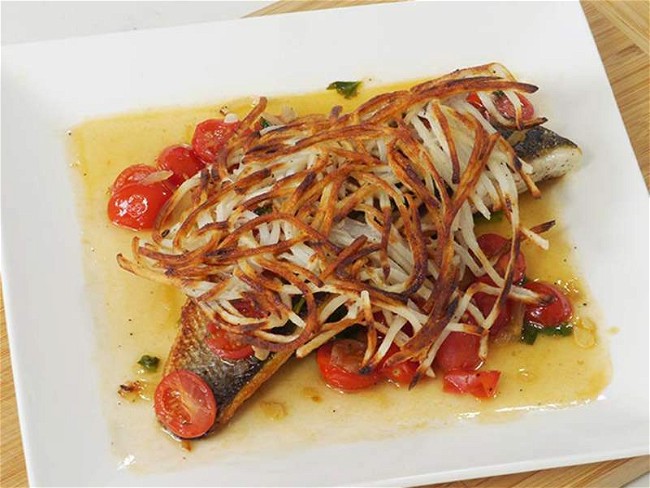 Image of Branzino Fillet over Spinach with Tomato Wine Sauce Recipe by Chef Massimo Gaffo
