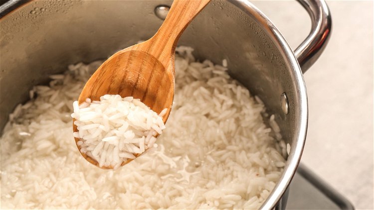 Image of Wash and cook 4 cups of white rice according to...