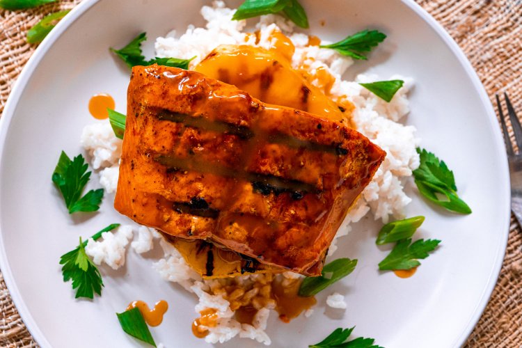 Image of Serve the grilled pineapple and salmon over the coconut rice...