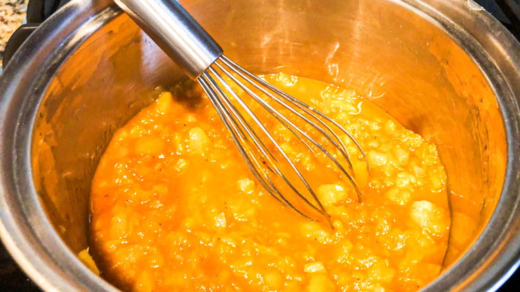 Image of Bring saucepan contents to low boil and simmer for 5-10 minutes until sauce is thickened and homogenous.