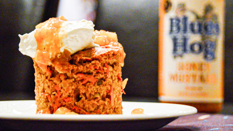 Image of Top with generous layers of whip cream and pineapple honey mustard sauce.