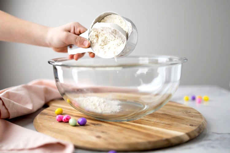 Image of 2. In a medium sized mixing bowl, sift together all...