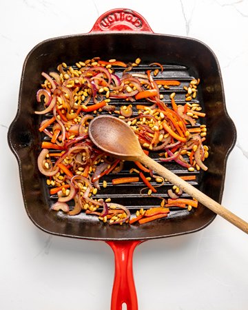 Image of Add capsicum and onion to pan and cook for one...