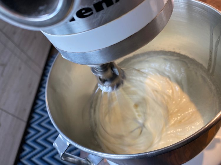 Image of Using an electric mixer, combine in mixing bowl sugar and...