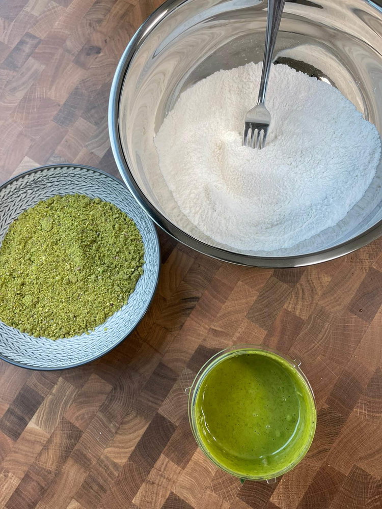 Image of Add the wet to the dry ingredients and lightly stir to combine. Fold in the Pistachios gently.