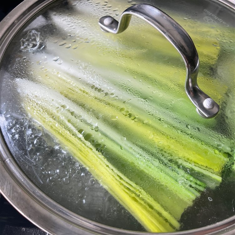 Image of Add the leeks and reduce the heat to a low...