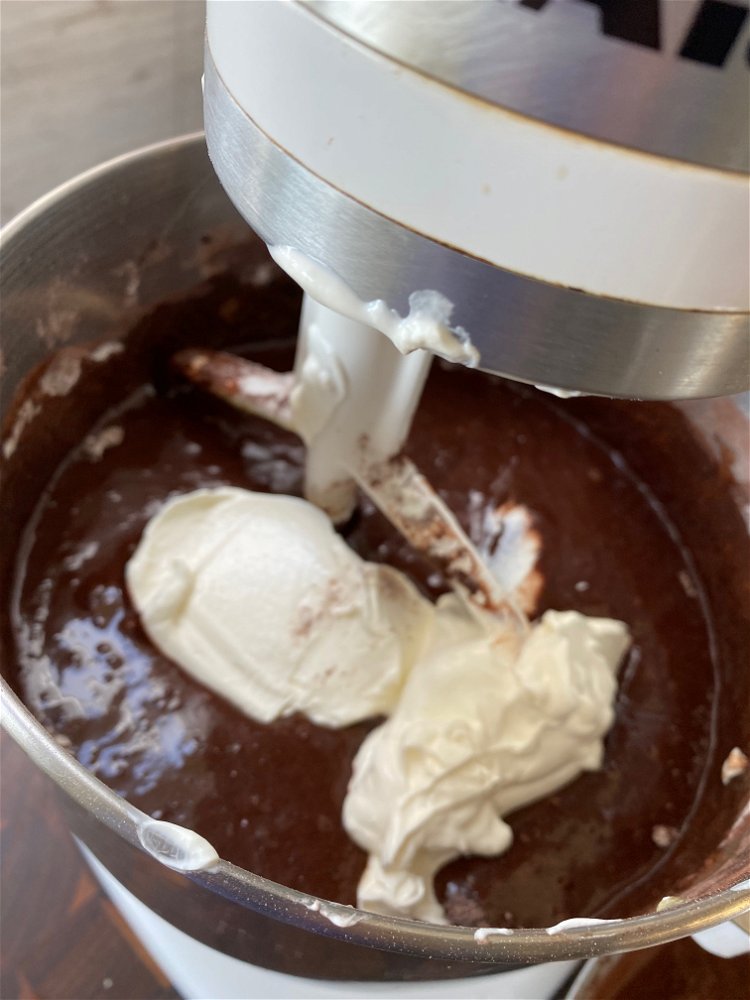 Image of Add in the sour cream and vanilla and mix till...