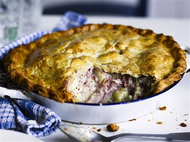 Image of Honey & mustard ham hock pie with flaky cheese pastry