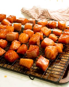 Image of drain the excess liquid and place salmon cubes on a...