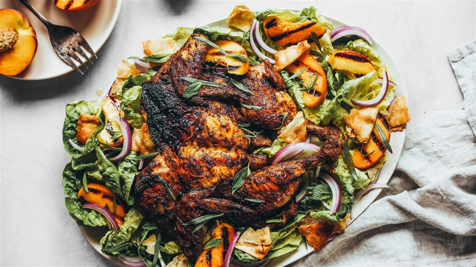 Image of Brined Spatchcock Chicken & Grilled Peach Fattoush
