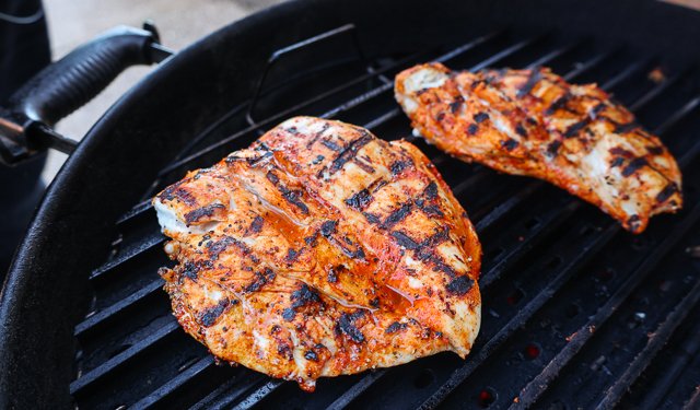 Image of Place breasts on grill and cook on each side about...