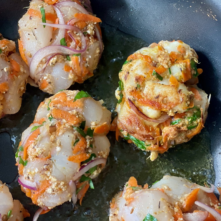 Image of Sear each fish cake until golden brown on both sides and cooked through, as more oil as needed.