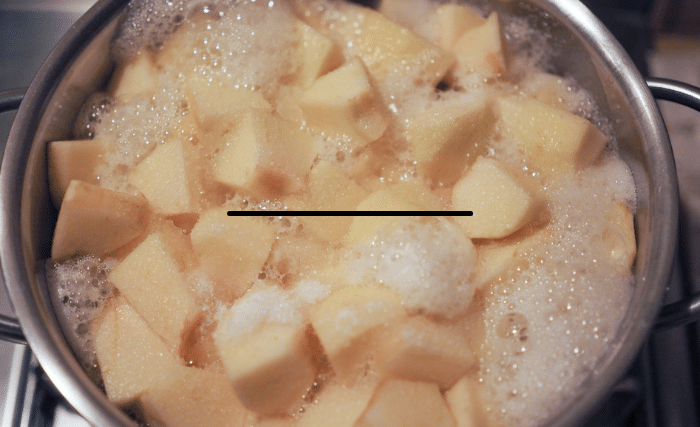 Image of Next cook the apples in a large pot with a...