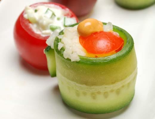Image of Stuffed Baby Heirloom Tomatoes and Cucumber Roll Hors d'Oeuvres