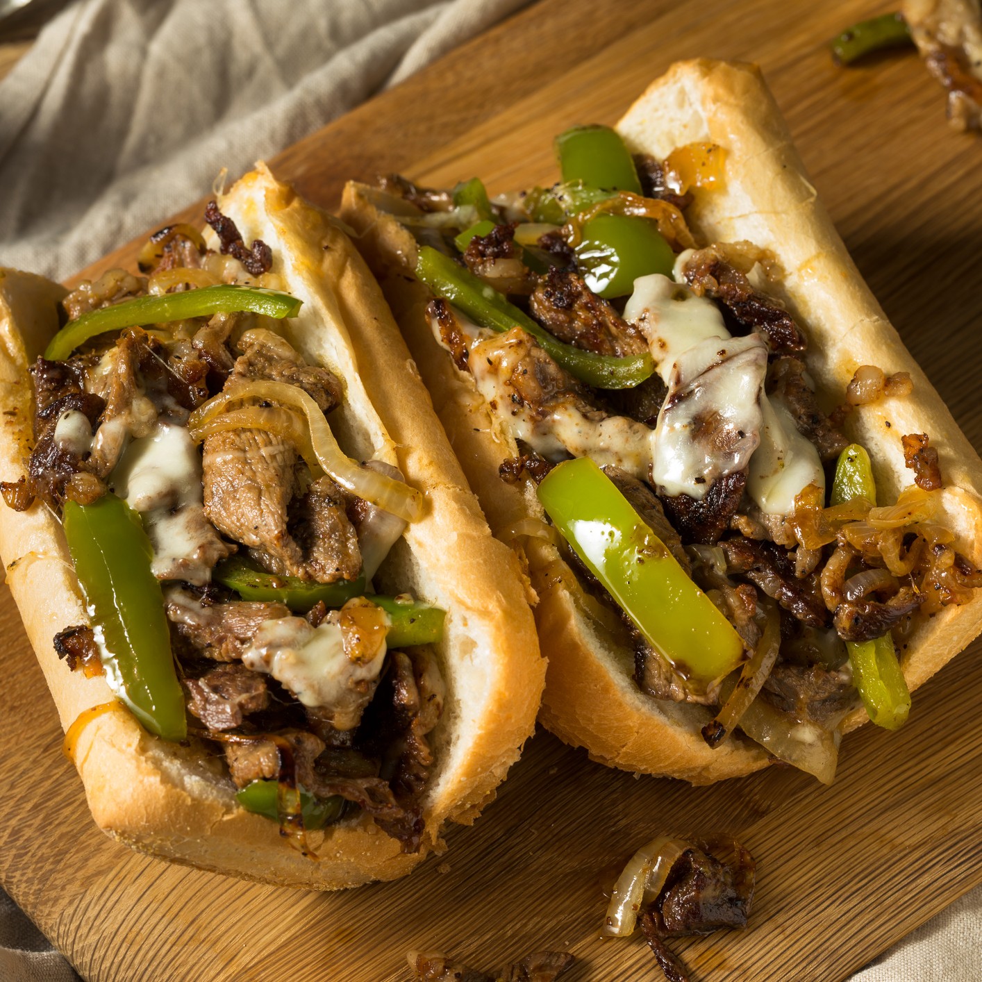 Authentic Philly Cheesesteak Sandwich - Alphafoodie