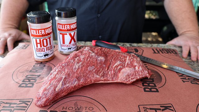 Image of Trim excess fat and sinew from Tri-tip roast and season...