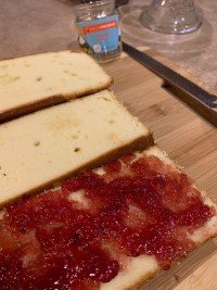Image of Slice pound cake in thirds lengthwise using a serrated bread...