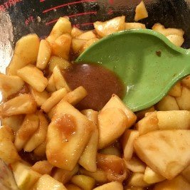 Image of In a large, microwave-safe bowl, combine the apple slices and...