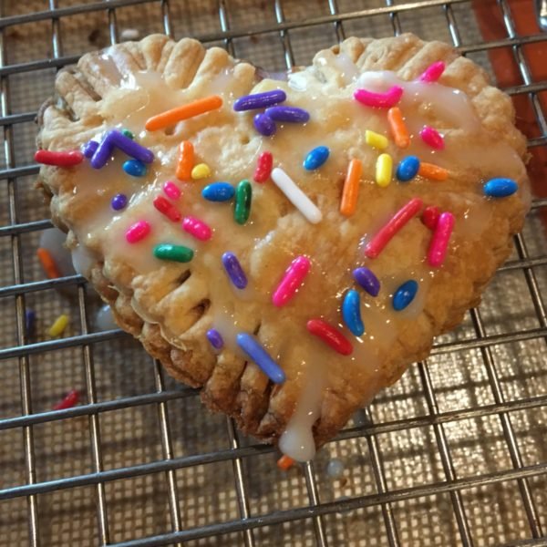 Image of Make the glaze while the Heart Tarts are cooling. Place...