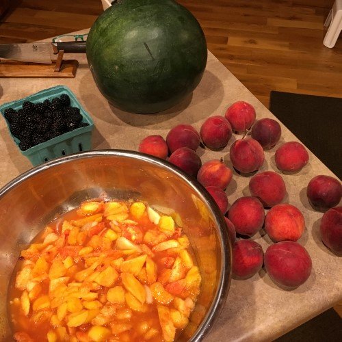 Image of Peel and slice peaches, catching and using all the juice....
