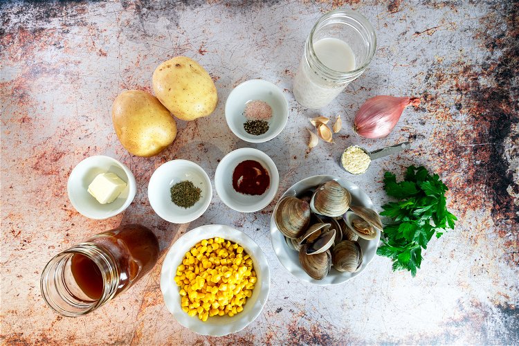 Image of Prepare the littleneck clams by placing the bag of frozen...