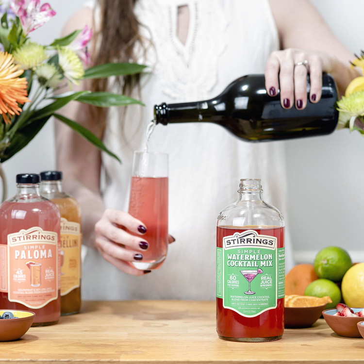 Image of Arrange bowls on your bar cart, add mixers, rimming sugar, and champagne or sparkling wine. You can also include other spirits like Tequila and Vodka.