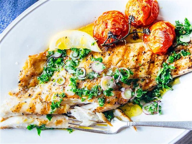 Image of Roasted Striped Bass with Blistered Tomatoes & Chimichurri Recipe