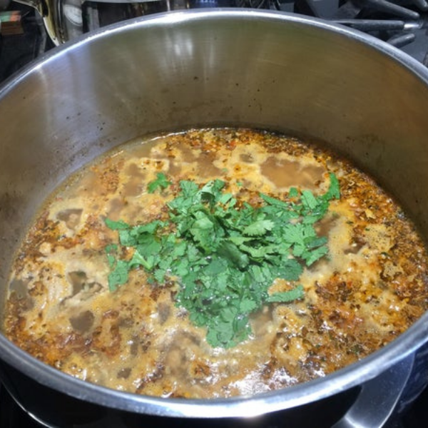 Image of When ready to serve, stir cilantro into the soup, divide...