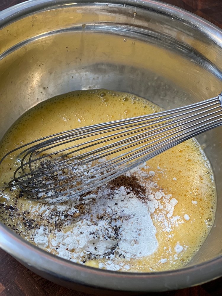 Image of Add the tumeric, flour, salt, pepper & fenugreek to eggs...