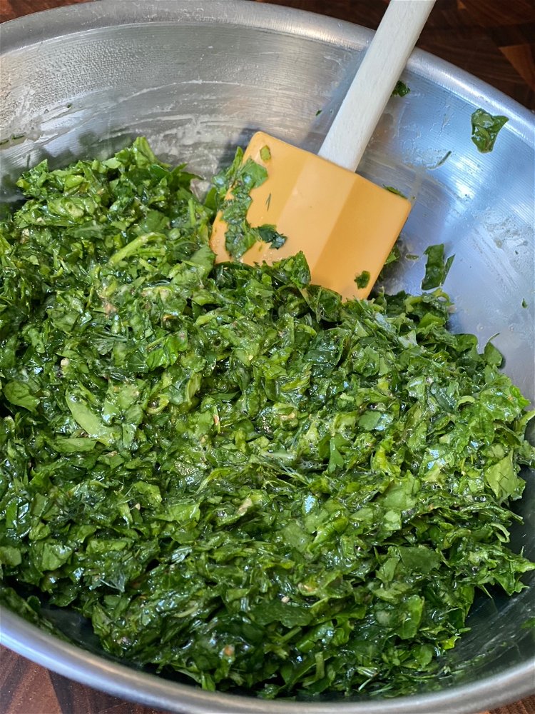 Image of Add the spinach and herbs to the egg mixture and...