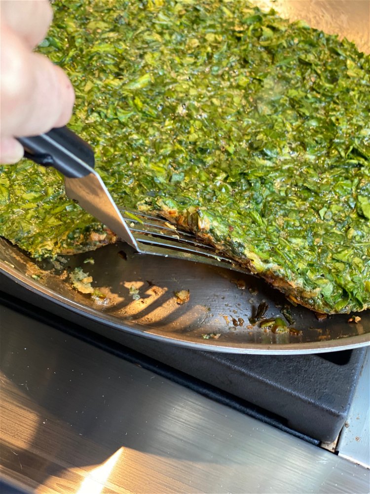 Image of Pour the spinach egg mixture into pan and cook for...