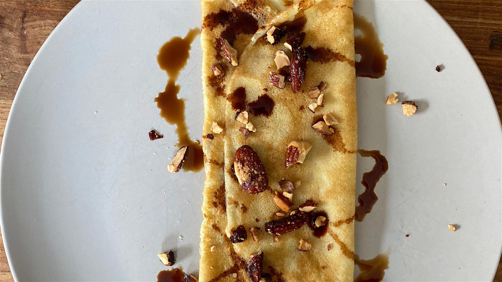 Image of Crèpes with Honeyed Almonds and Date Syrup