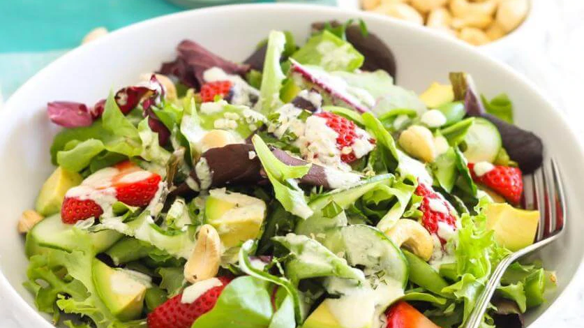 Image of Strawberry Avocado Salad with Hemp Tahini Dressing Recipe